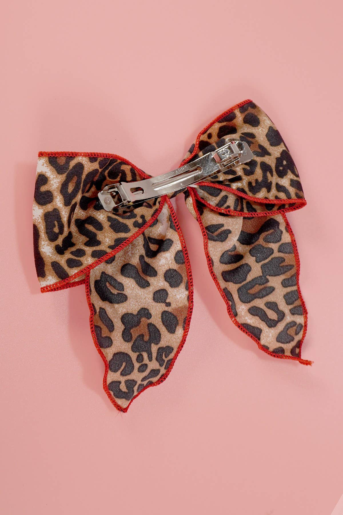 ANIMAL LEOPARD RED TRIM BOW HAIR CLIP